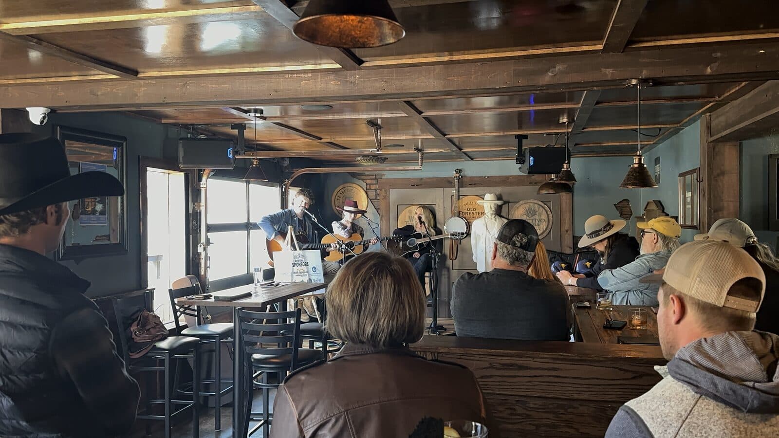 Packed bar venue during a songwriter round at the 2024 Invitational